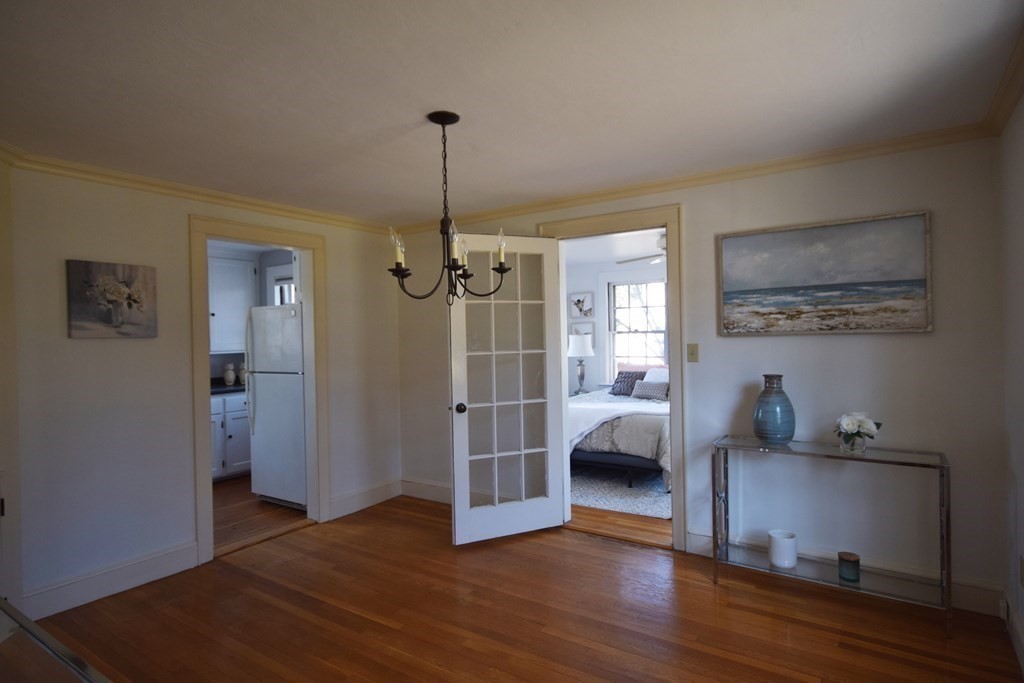 9 Wilde Road Wellesley, MA 02481 - Photo 8 of 18 a view of empty room and wooden floor