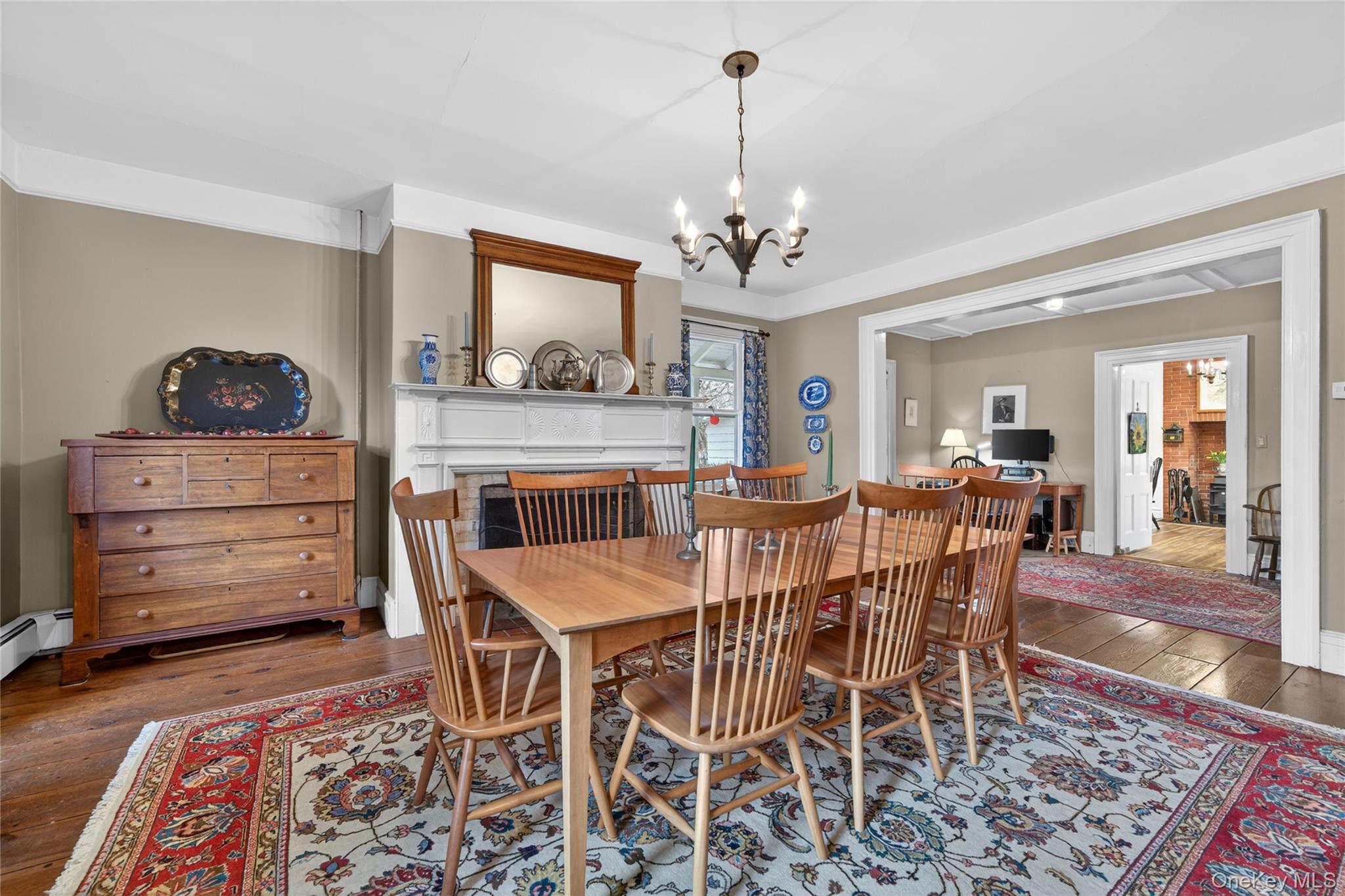 90 Quaker Avenue Cornwall, NY 12518 - Photo 11 of 50 a view of a dining room with furniture and wooden floor