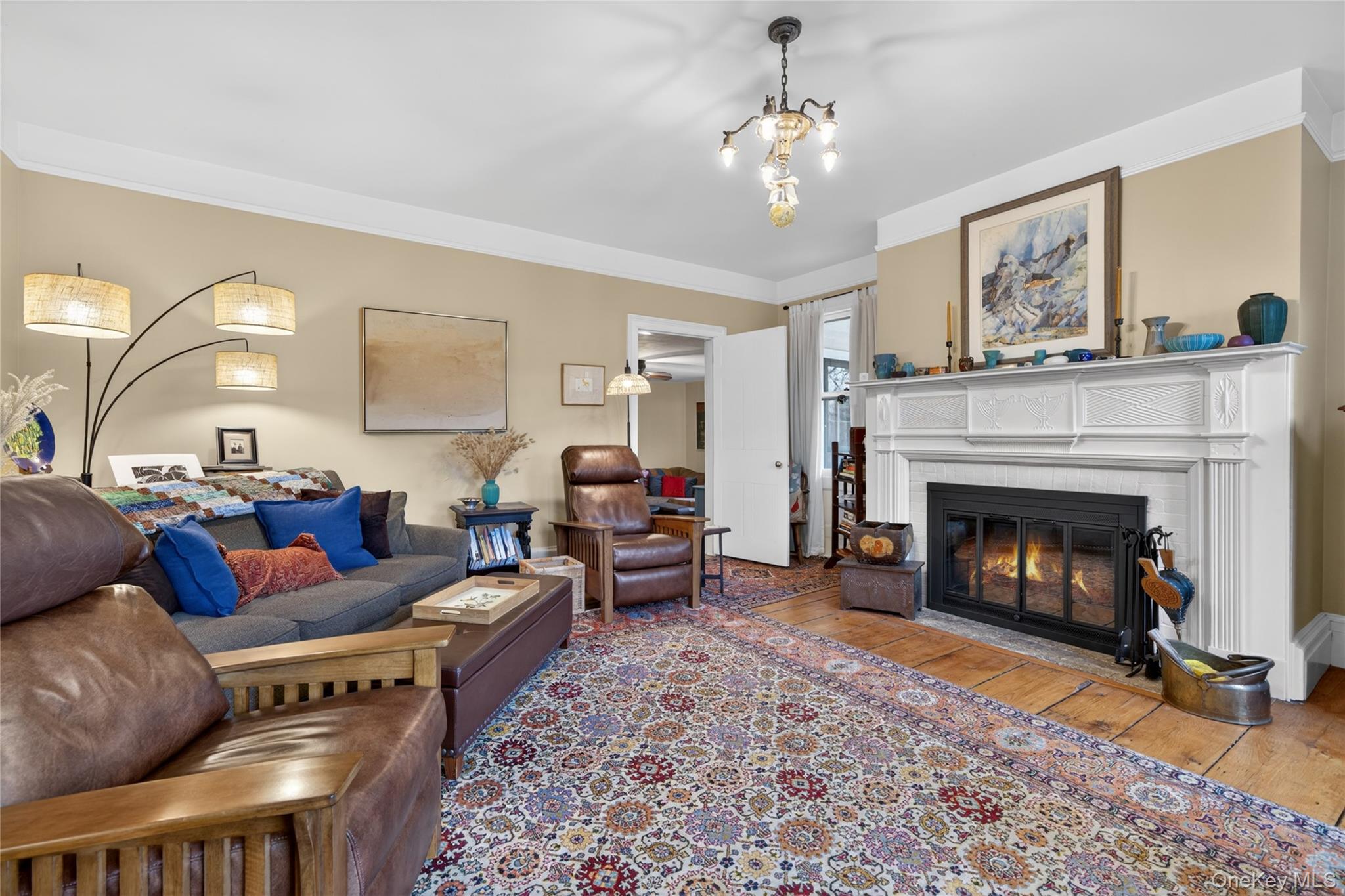 90 Quaker Avenue Cornwall, NY 12518 - Photo 20 of 50 a living room with furniture and a fireplace