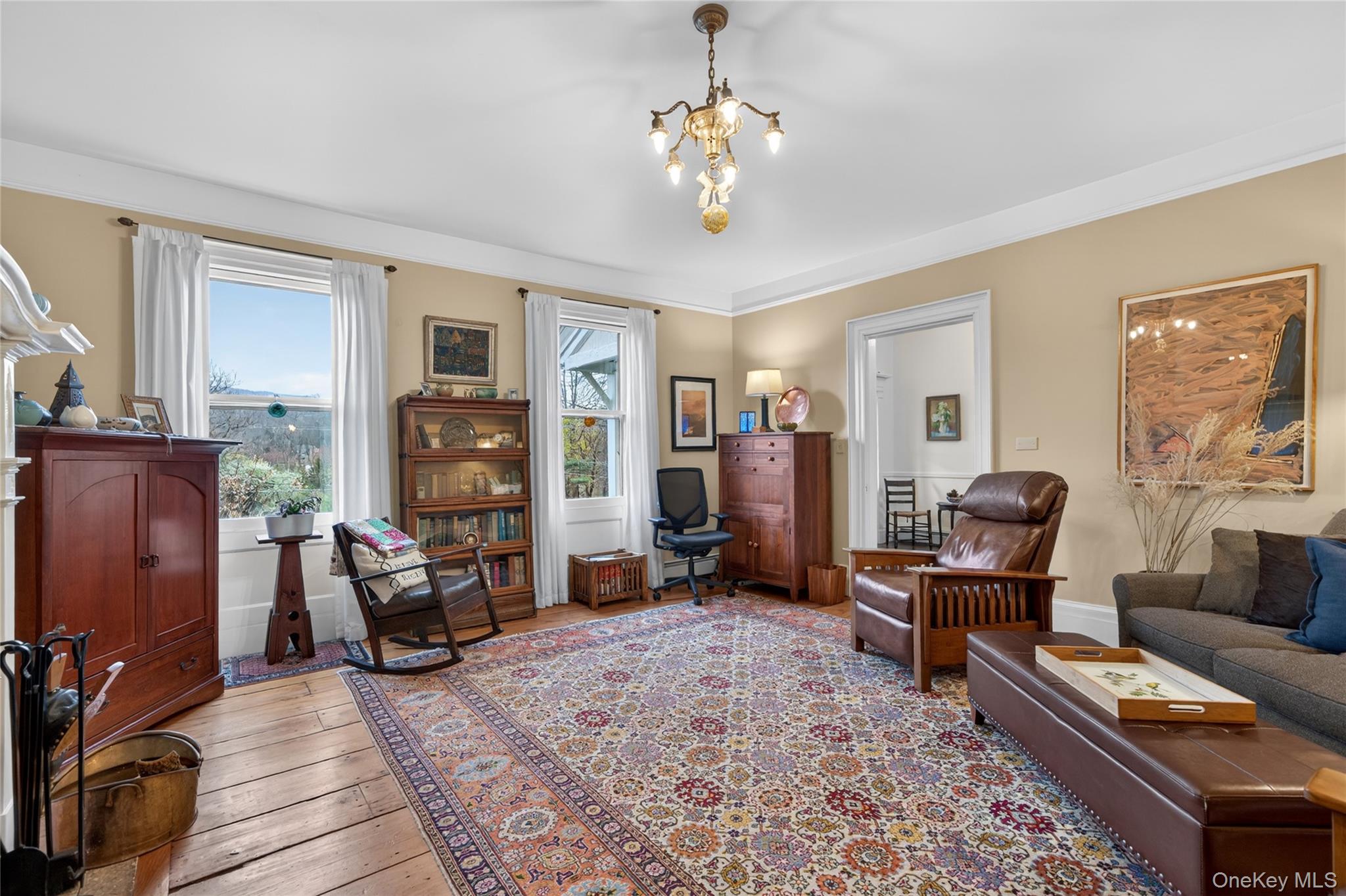 90 Quaker Avenue Cornwall, NY 12518 - Photo 21 of 50 a living room with furniture and a flat screen tv