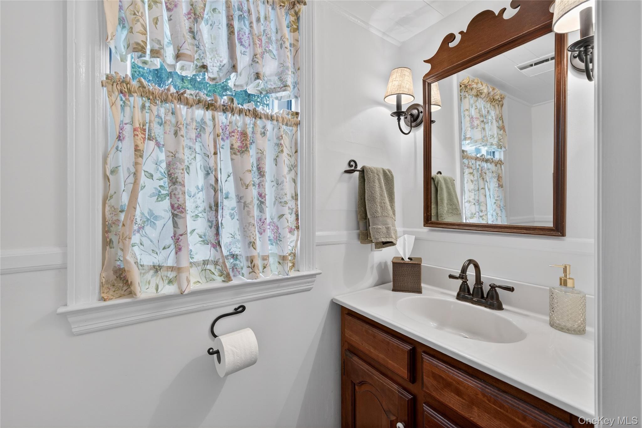 90 Quaker Avenue Cornwall, NY 12518 - Photo 24 of 50 a bathroom with a granite countertop sink a mirror and shower curtain