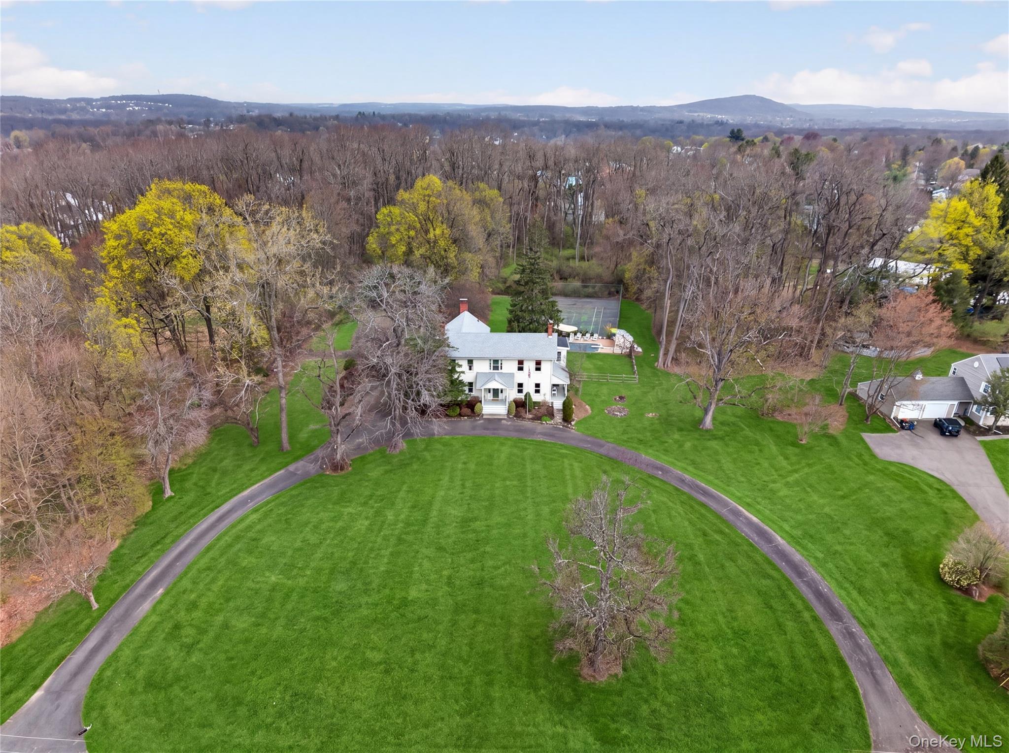 90 Quaker Avenue Cornwall, NY 12518 - Photo 3 of 50 an aerial view of a house with a yard
