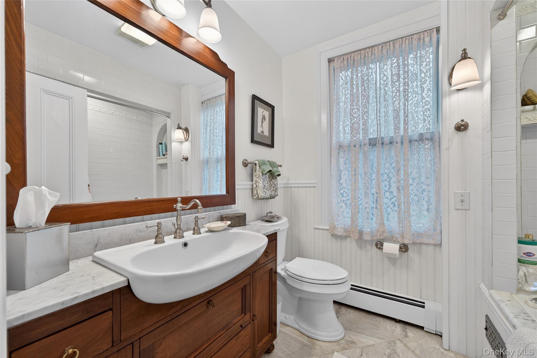 90 Quaker Avenue Cornwall, NY 12518 - Photo 31 of 50 a bathroom with a sink toilet and shower