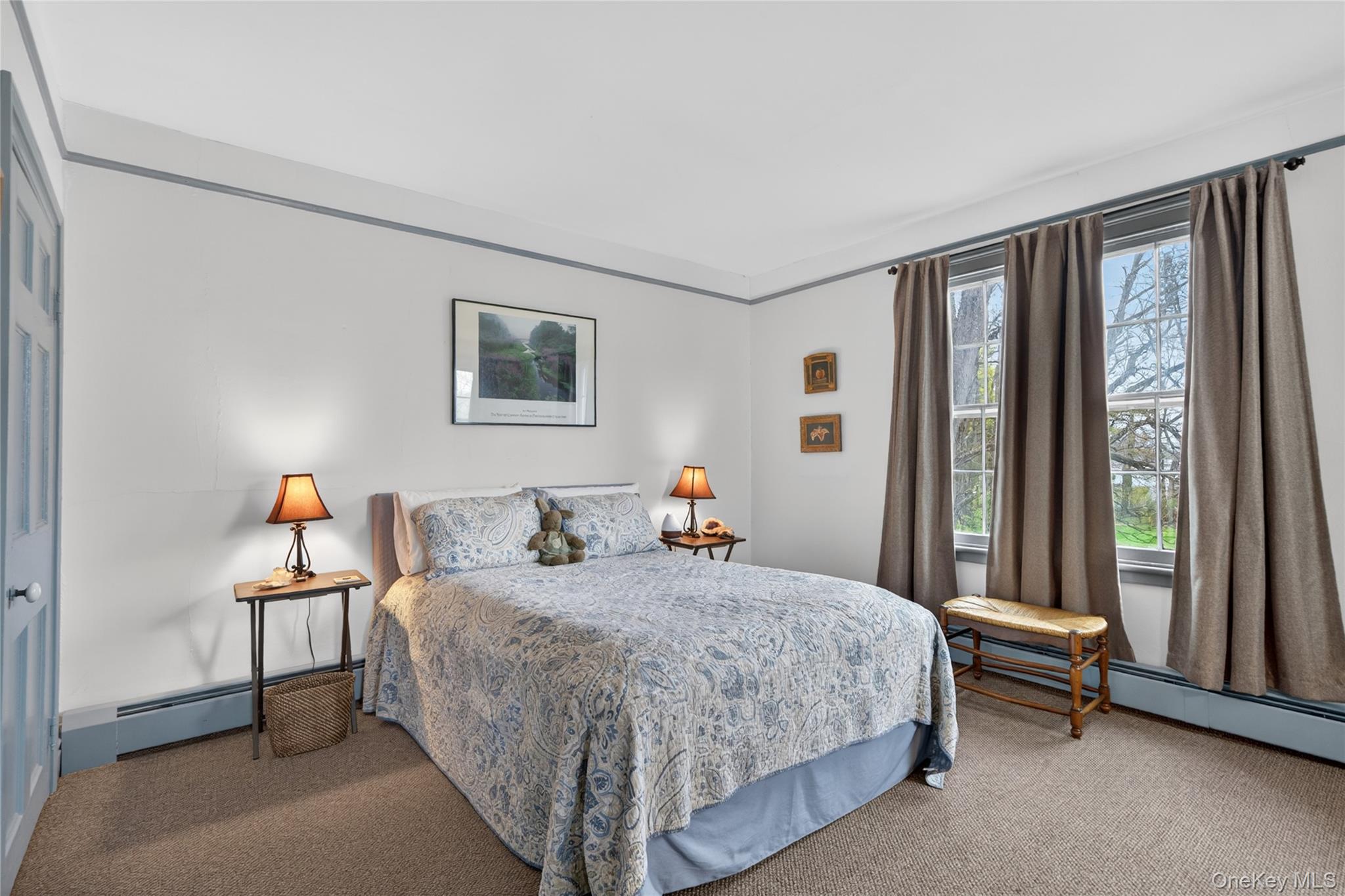 90 Quaker Avenue Cornwall, NY 12518 - Photo 33 of 50 a bedroom with a bed and a large window