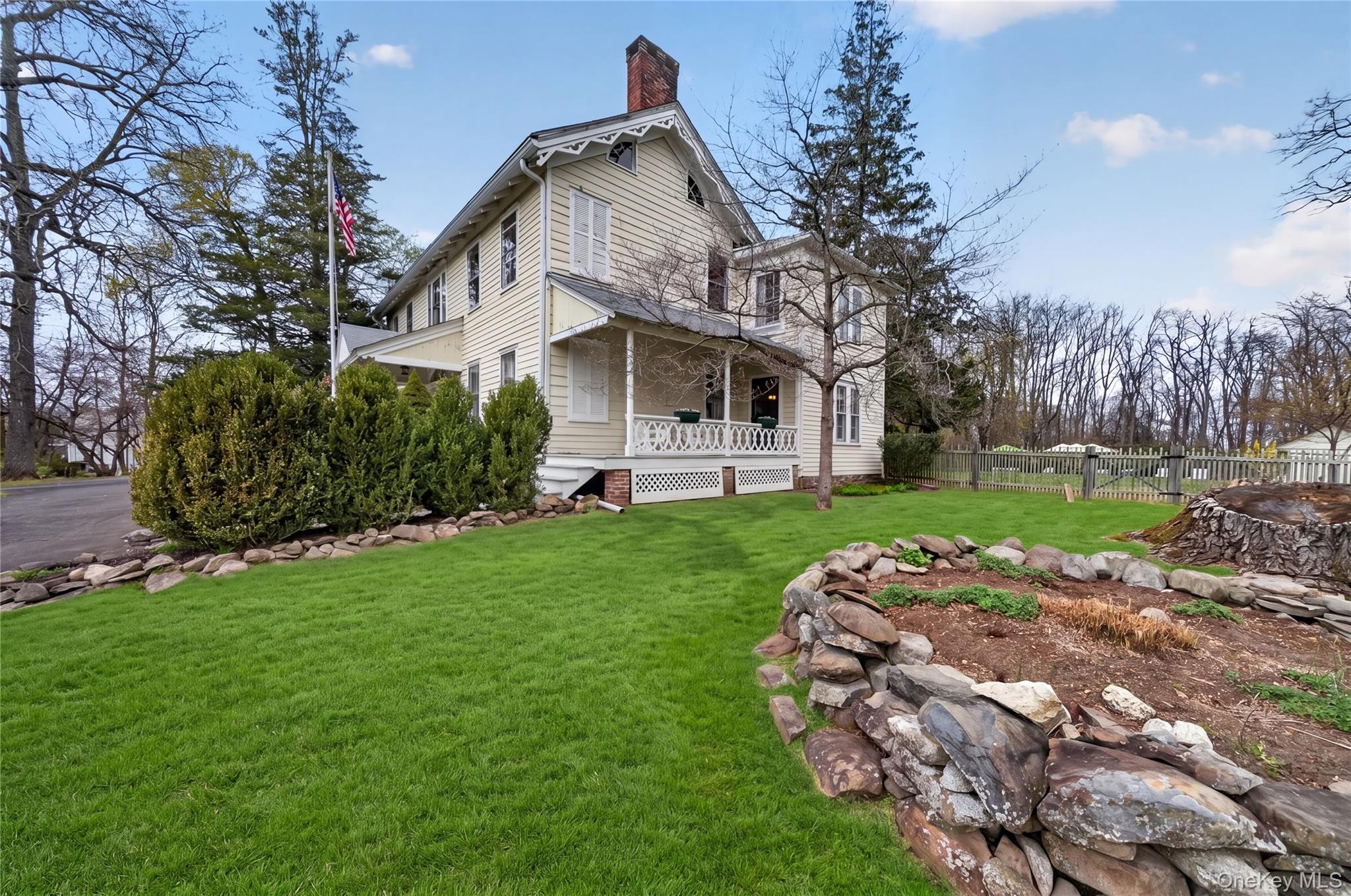 90 Quaker Avenue Cornwall, NY 12518 - Photo 39 of 50 a view of a white house with a big yard plants and large trees