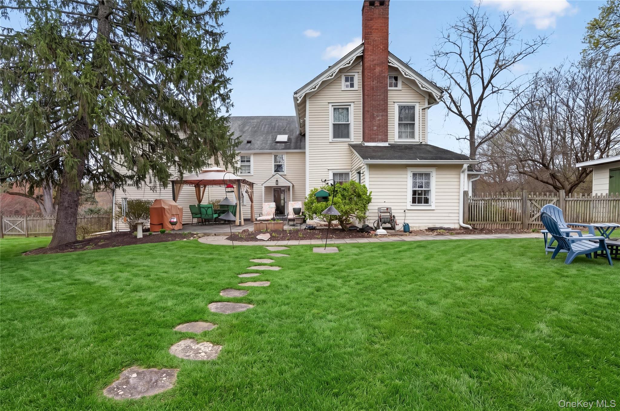 90 Quaker Avenue Cornwall, NY 12518 - Photo 40 of 50 a front view of a house with garden