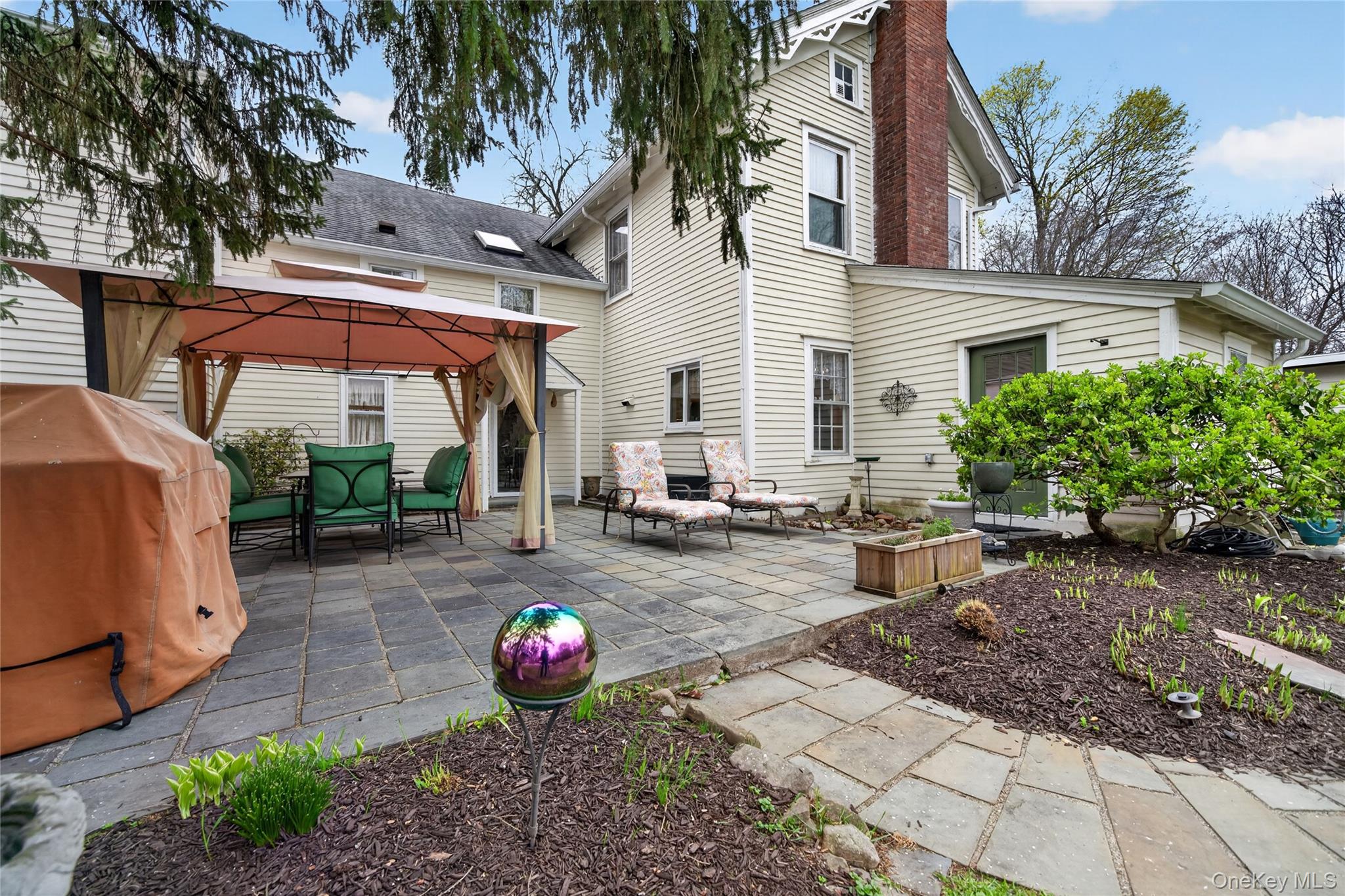 90 Quaker Avenue Cornwall, NY 12518 - Photo 41 of 50 a view of a chairs and table in backyard