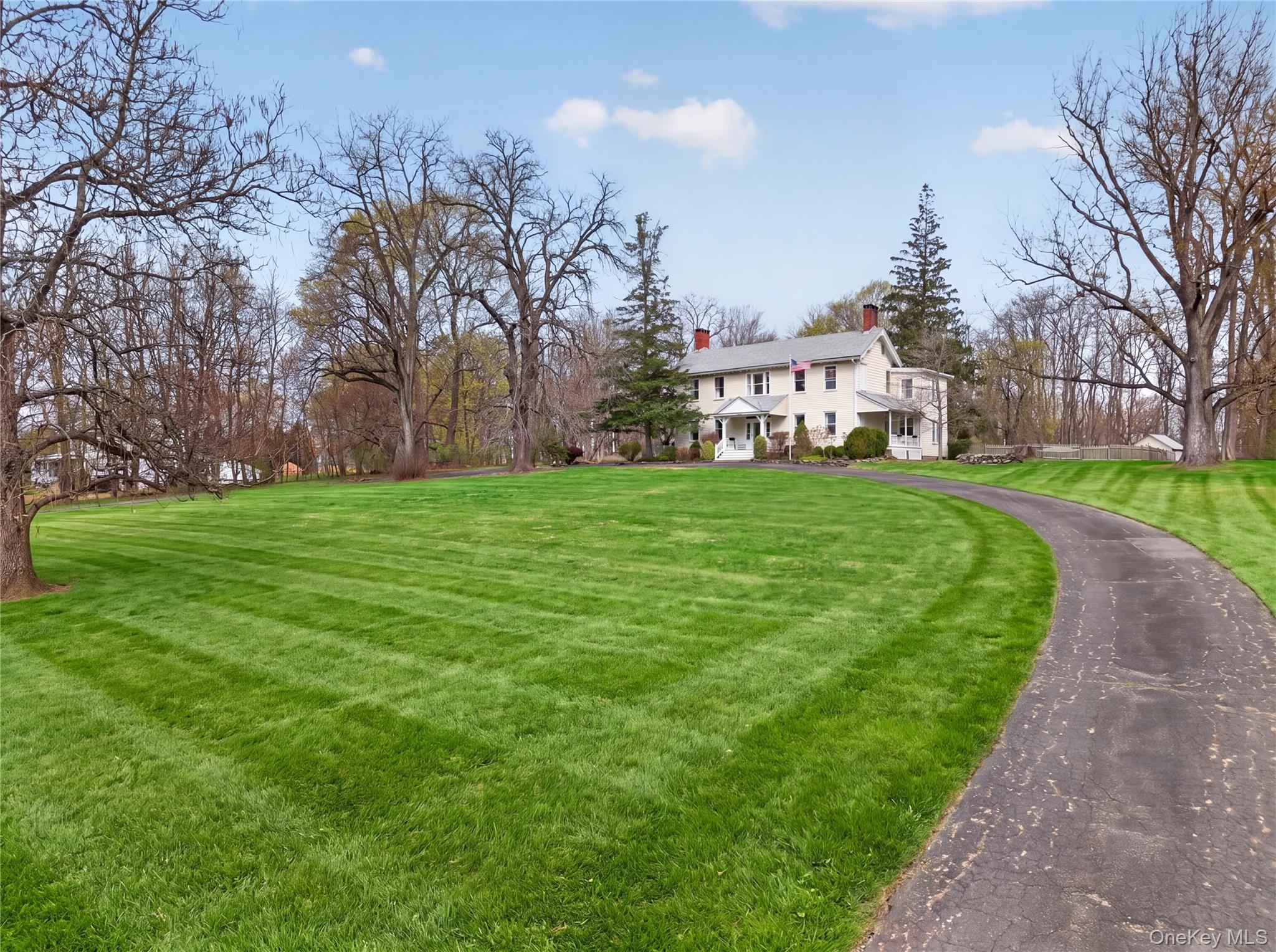 90 Quaker Avenue Cornwall, NY 12518 - Photo 5 of 50 a view of a park with a house in the background