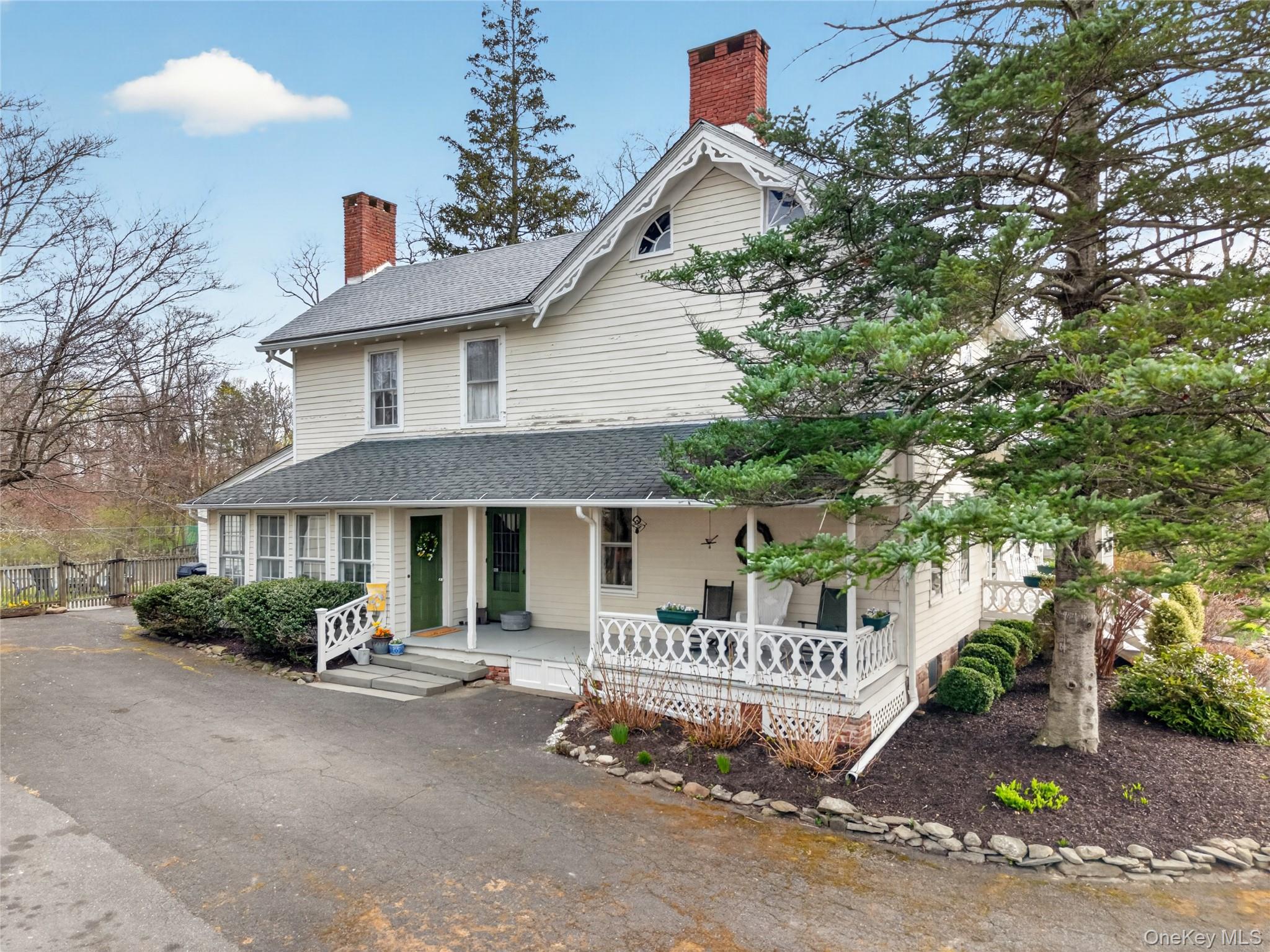 90 Quaker Avenue Cornwall, NY 12518 - Photo 6 of 50 a front view of a house with a garden