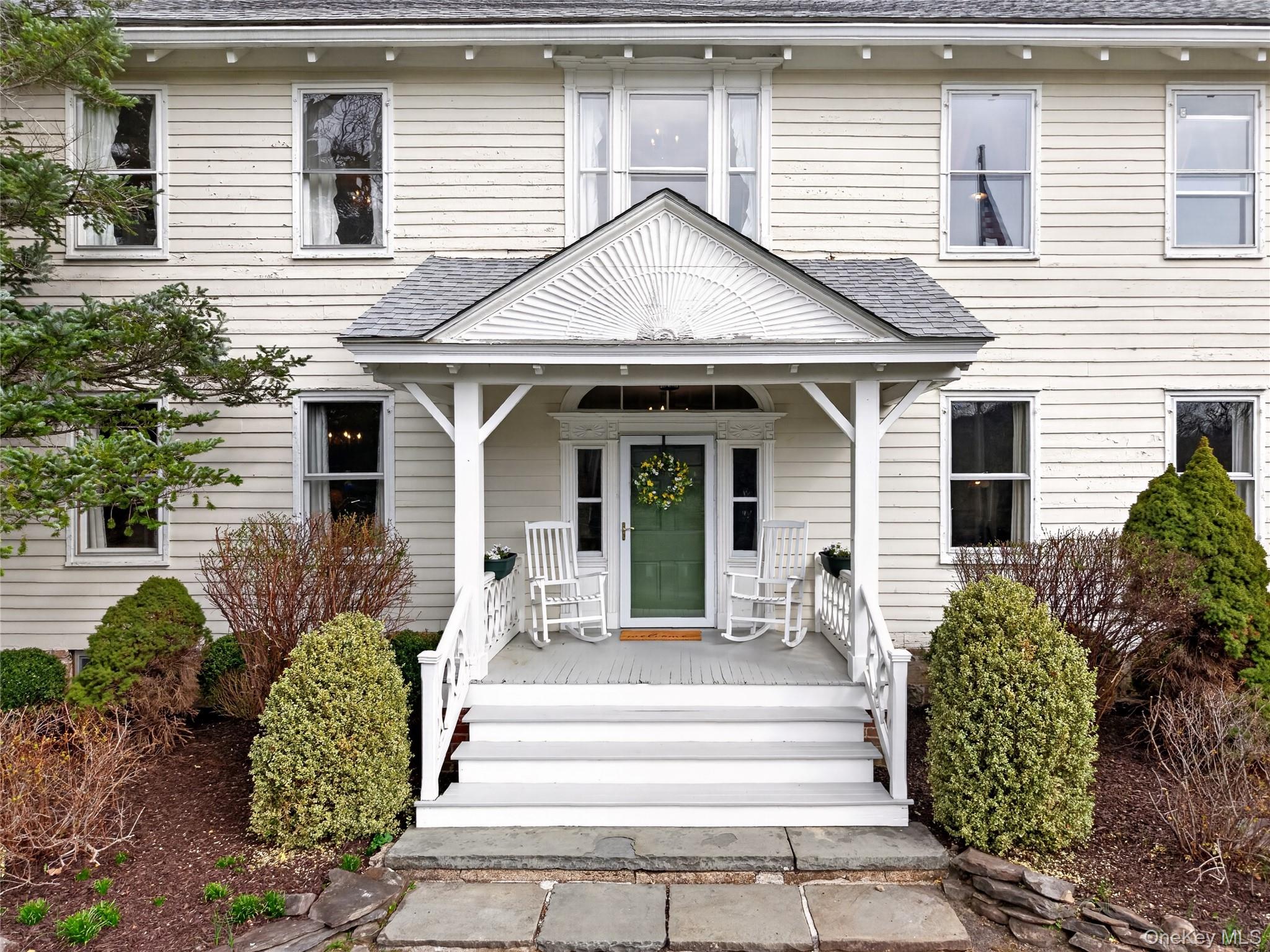 90 Quaker Avenue Cornwall, NY 12518 - Photo 8 of 50 a front view of a house with garden