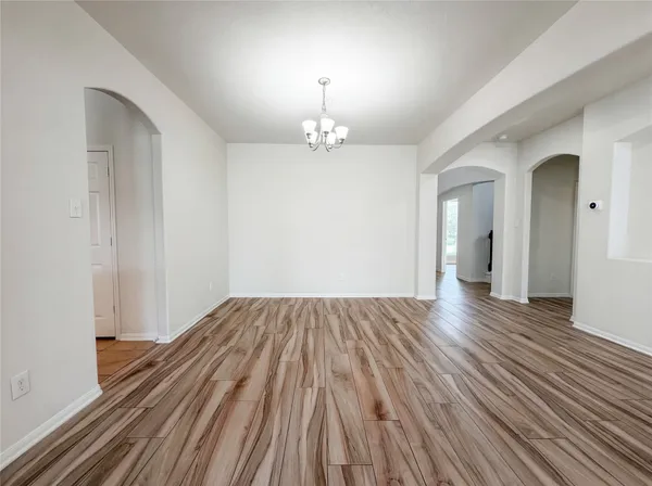 a kitchen with a cabinets and window