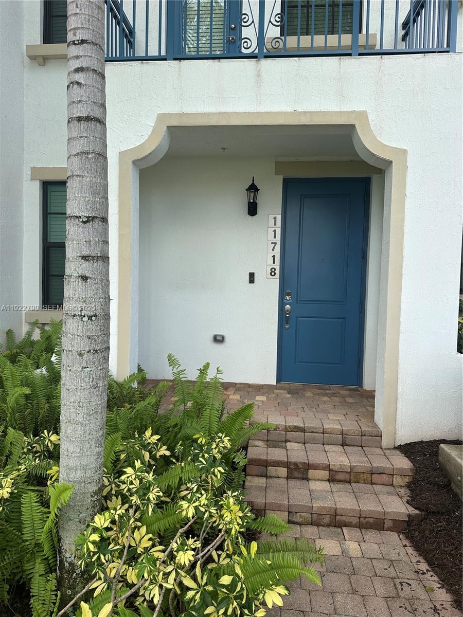 11718 Southwest 13th Ct. Pembroke Pines, FL 33025 - Photo 1 of 35 a front view of a house