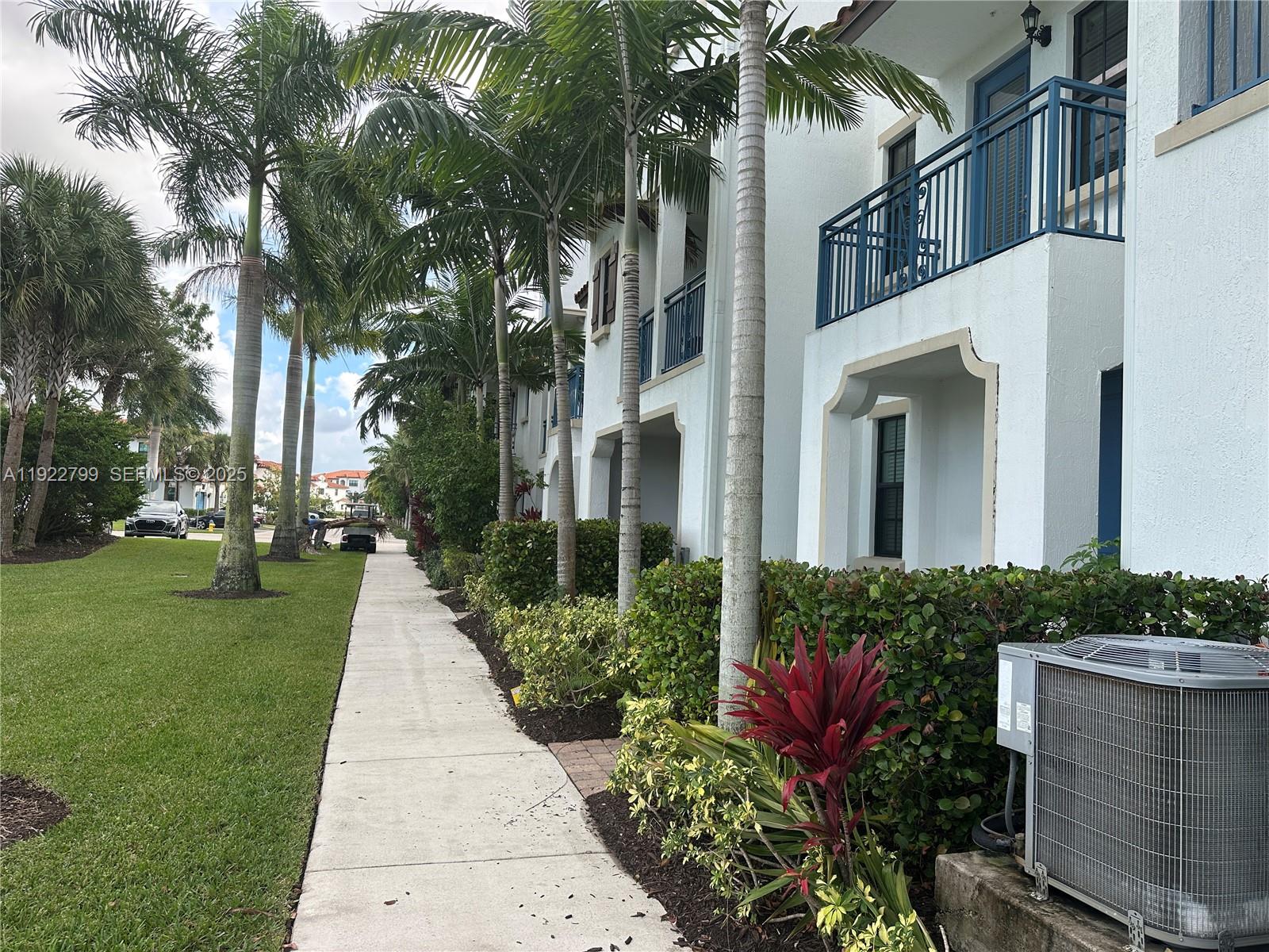 11718 Southwest 13th Ct. Pembroke Pines, FL 33025 - Photo 2 of 35 a front view of a house having yard