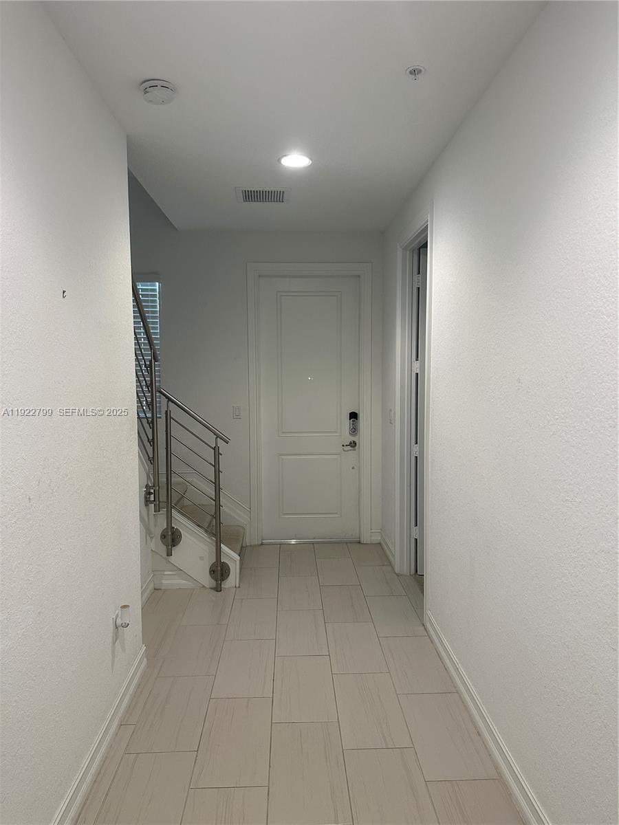 11718 Southwest 13th Ct. Pembroke Pines, FL 33025 - Photo 28 of 35 a view of an empty room