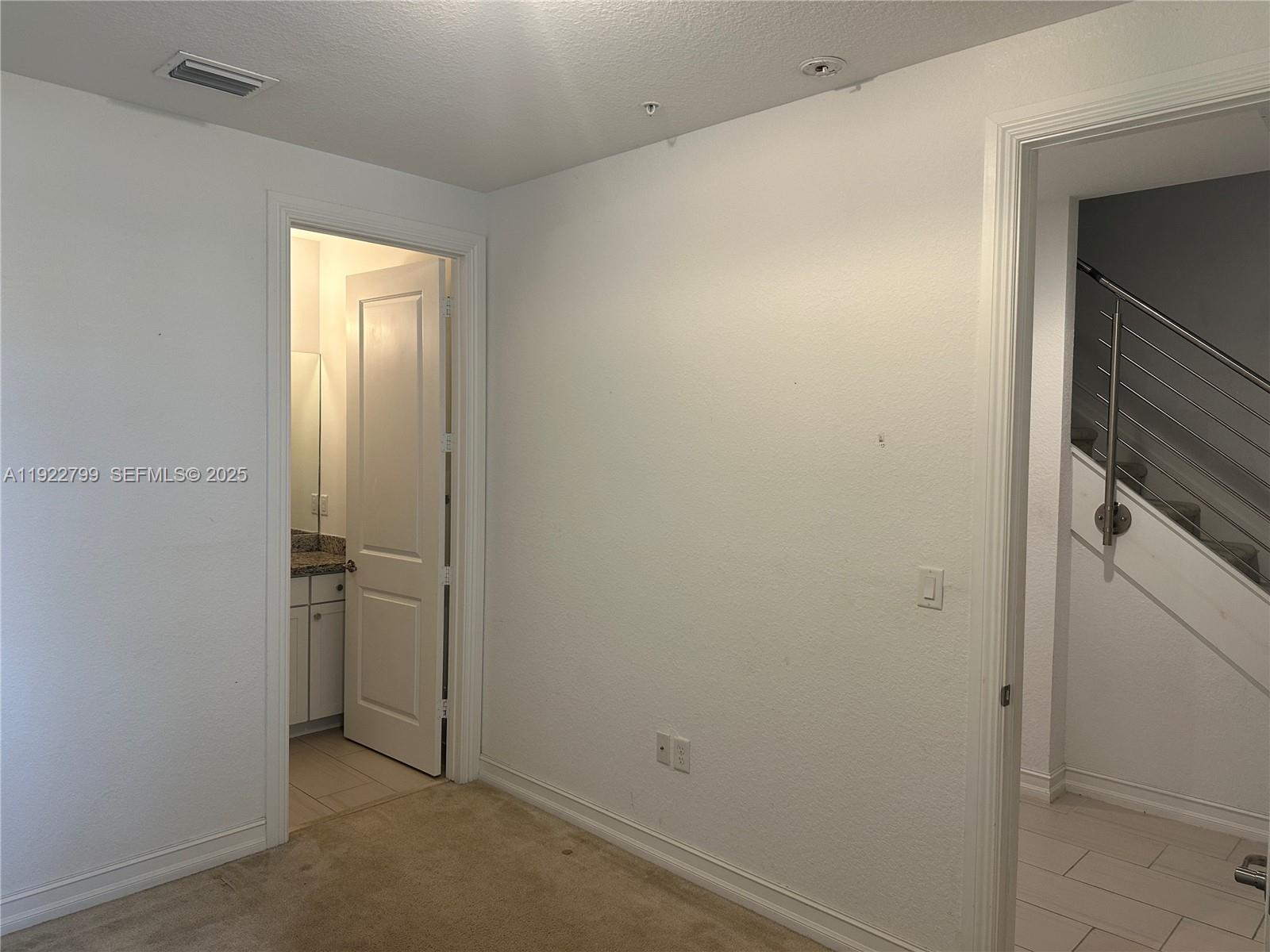 11718 Southwest 13th Ct. Pembroke Pines, FL 33025 - Photo 29 of 35 a view of an empty room