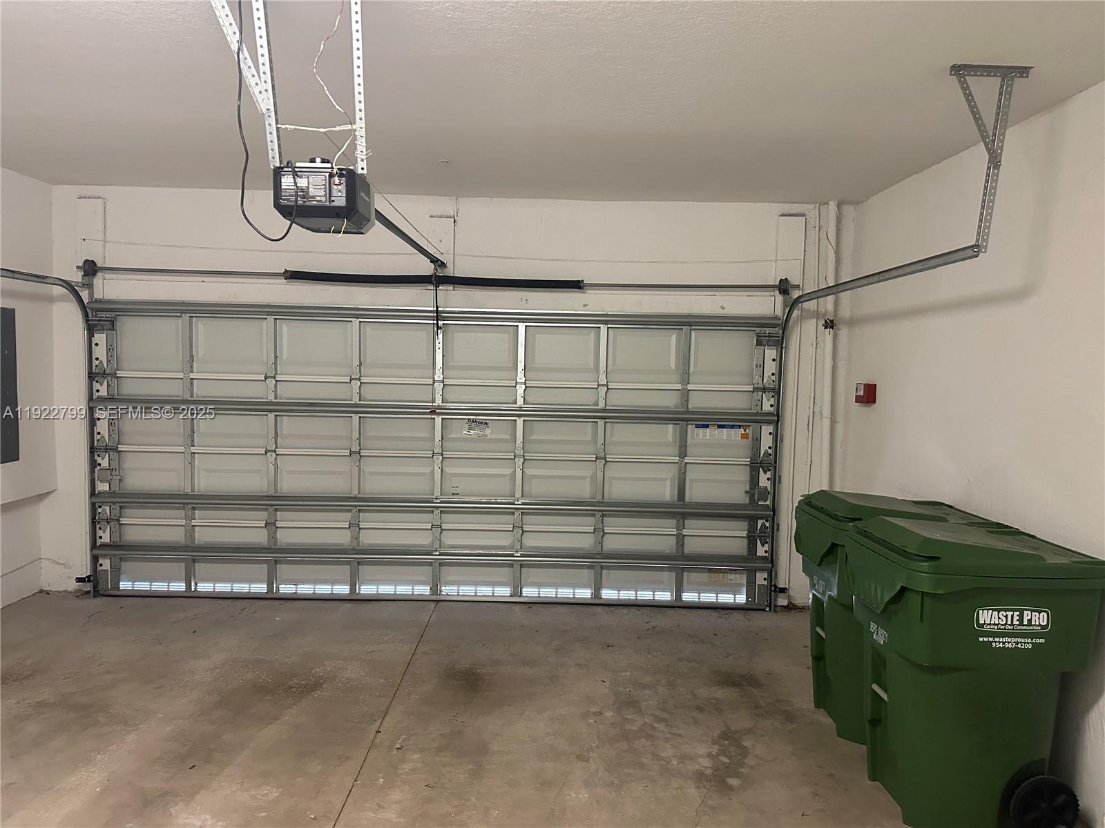 11718 Southwest 13th Ct. Pembroke Pines, FL 33025 - Photo 33 of 35 a view of a garage