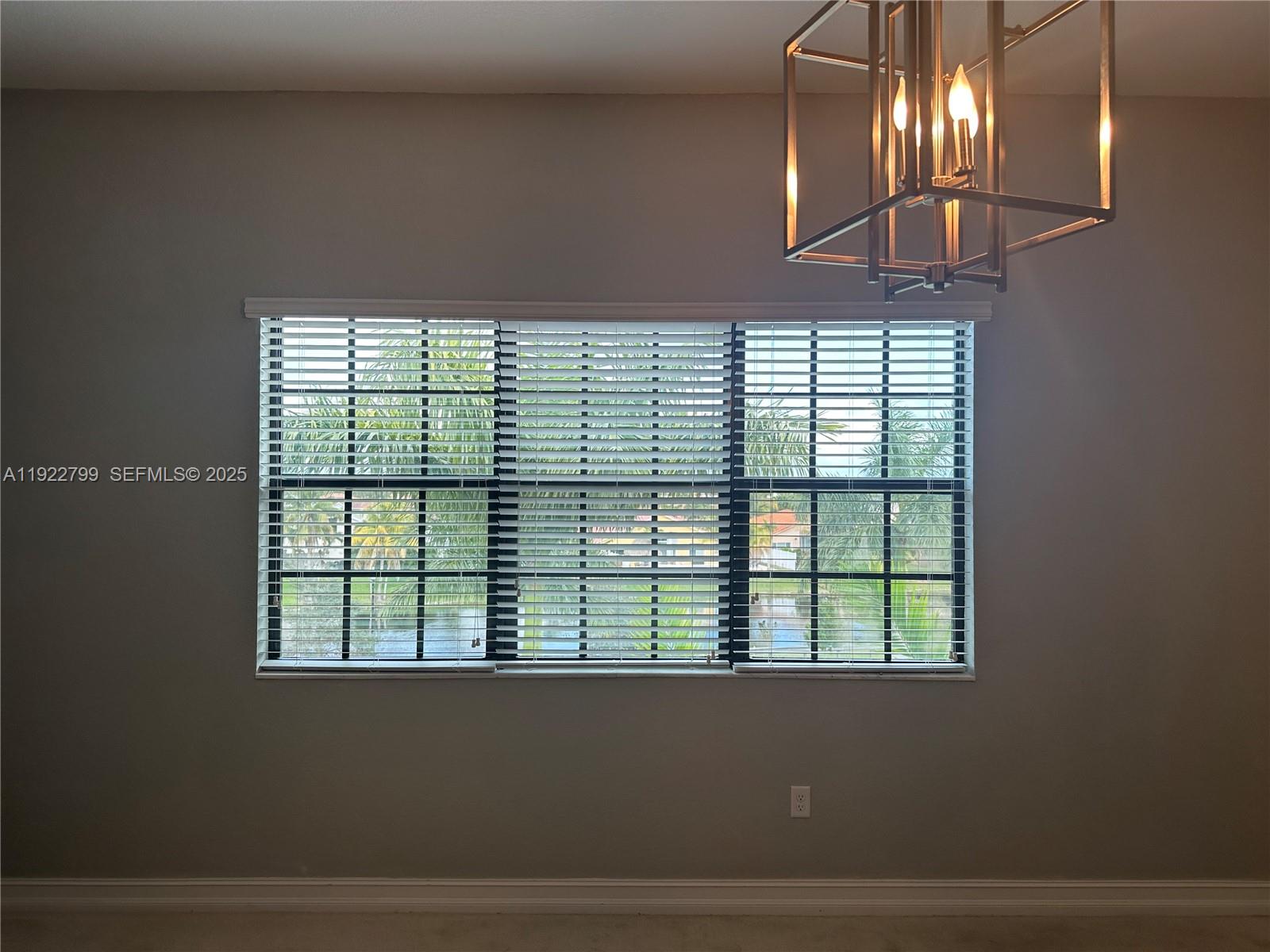 11718 Southwest 13th Ct. Pembroke Pines, FL 33025 - Photo 8 of 35 a view of empty room with window