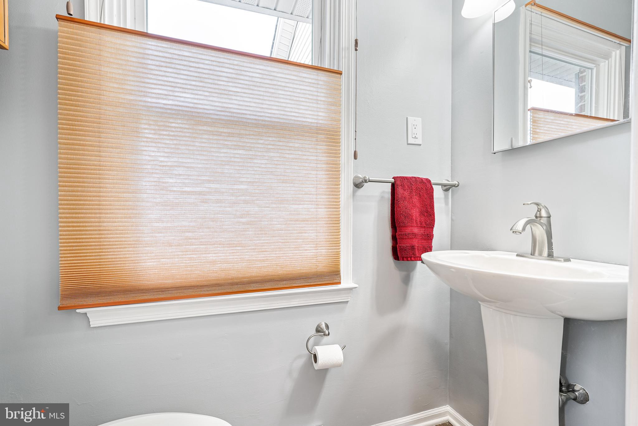 7 Congress Drive Bear, DE 19701 - Photo 16 of 37 a bathroom with a sink and a mirror