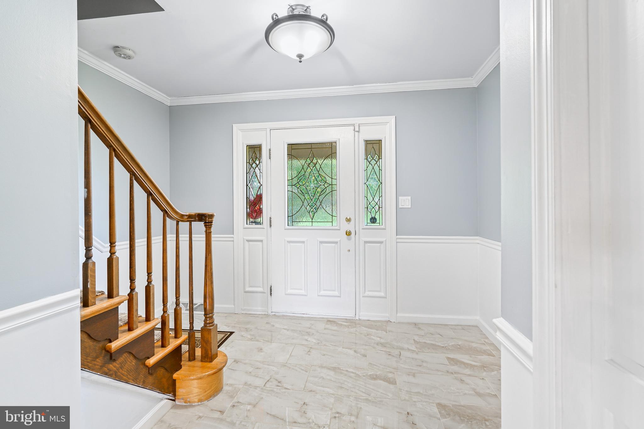 7 Congress Drive Bear, DE 19701 - Photo 17 of 37 a view of an empty room with wooden floor and a window