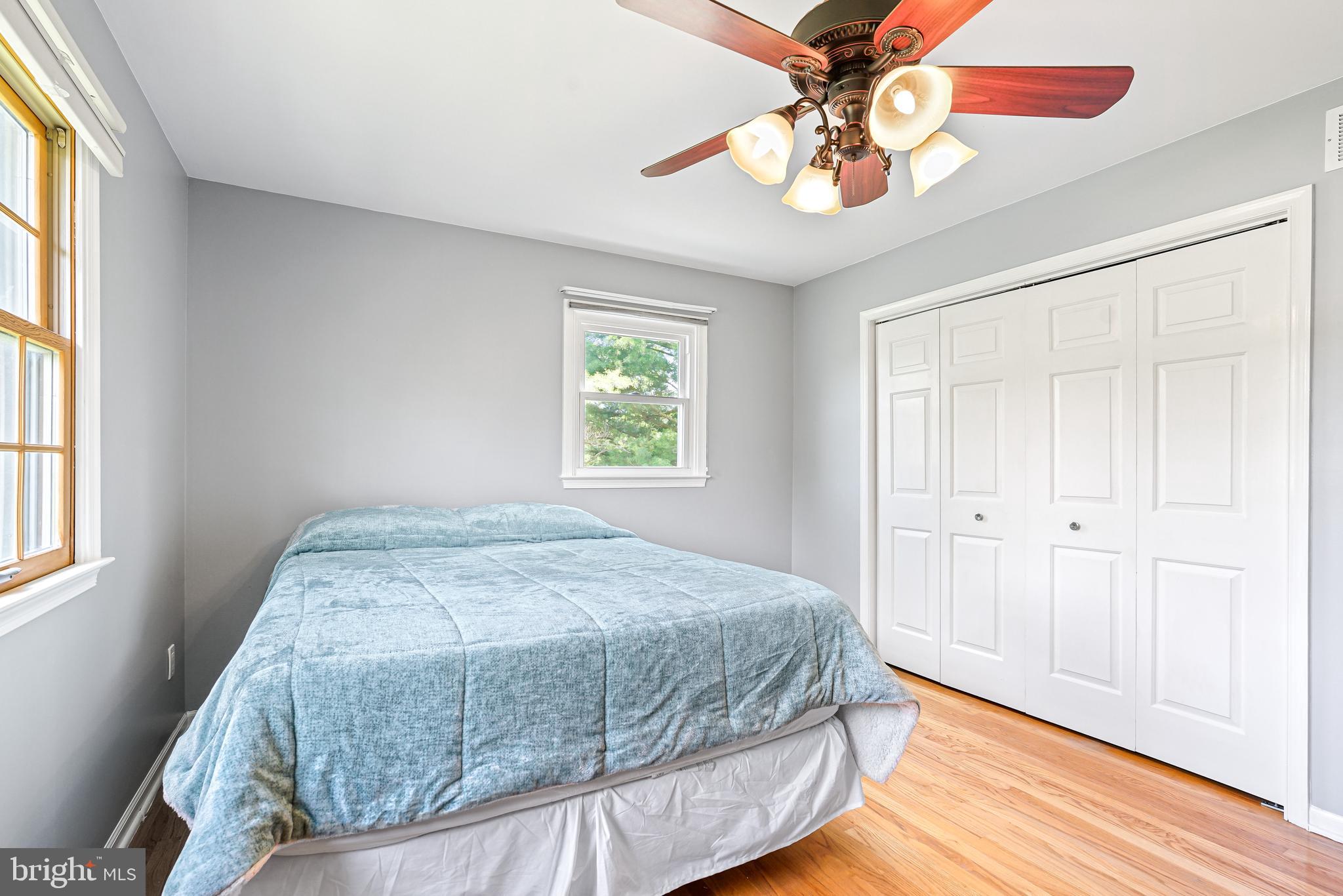 7 Congress Drive Bear, DE 19701 - Photo 24 of 37 a bedroom with a bed chandelier and a window