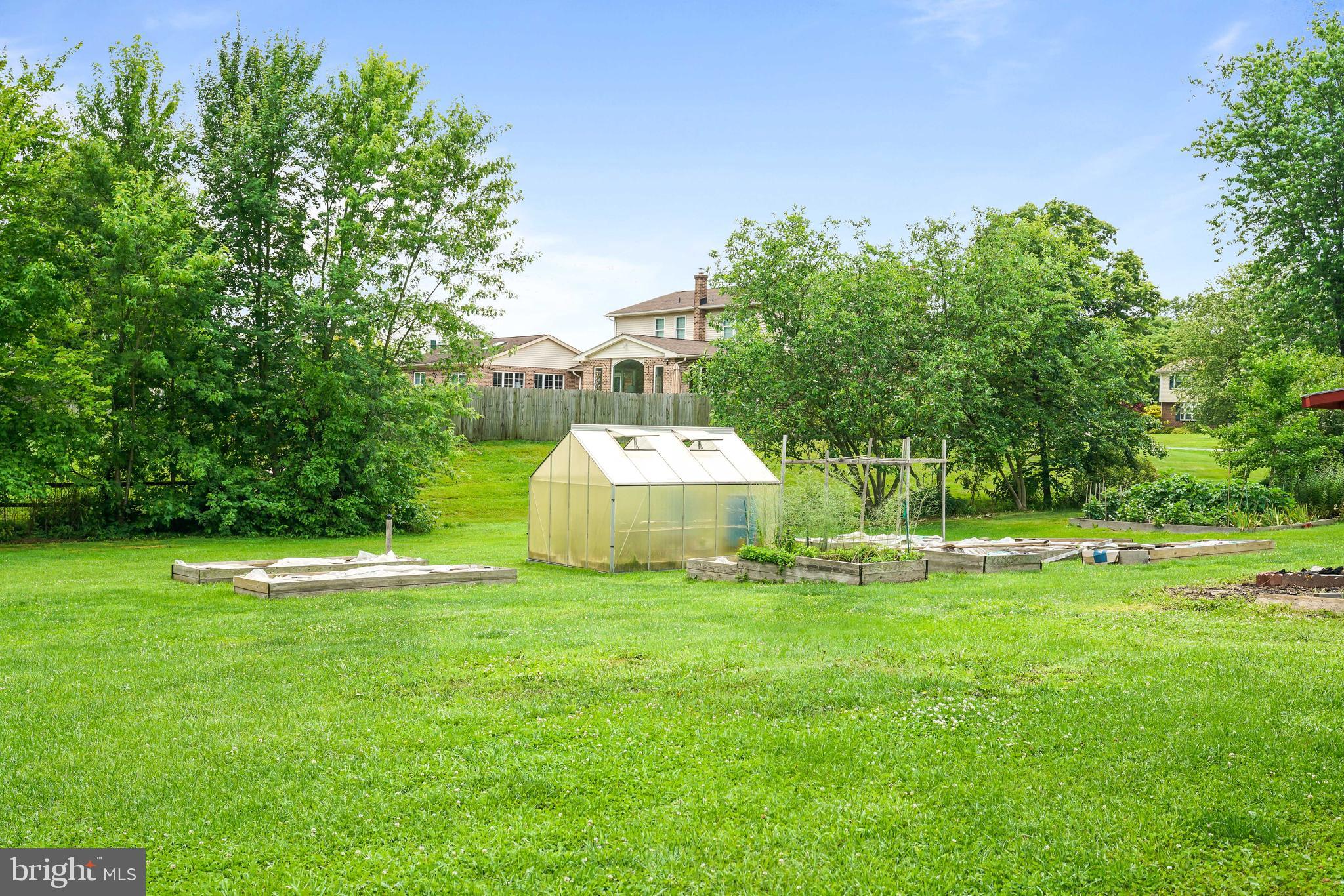 7 Congress Drive Bear, DE 19701 - Photo 34 of 37 a white house with a big yard and large trees