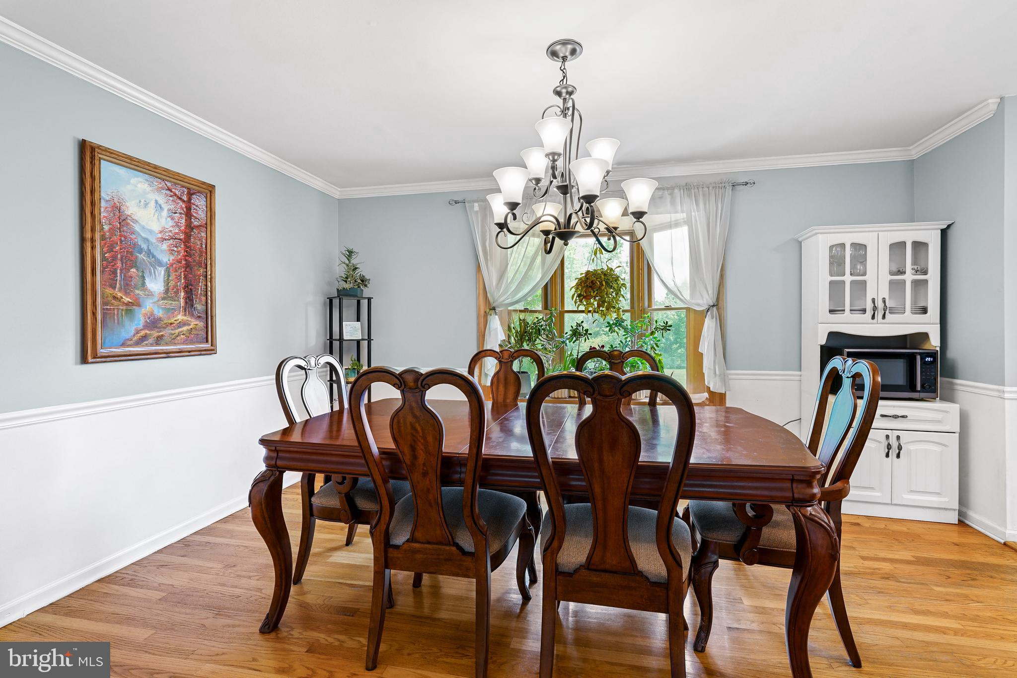 7 Congress Drive Bear, DE 19701 - Photo 5 of 37 a view of a dining room with furniture and chandelier