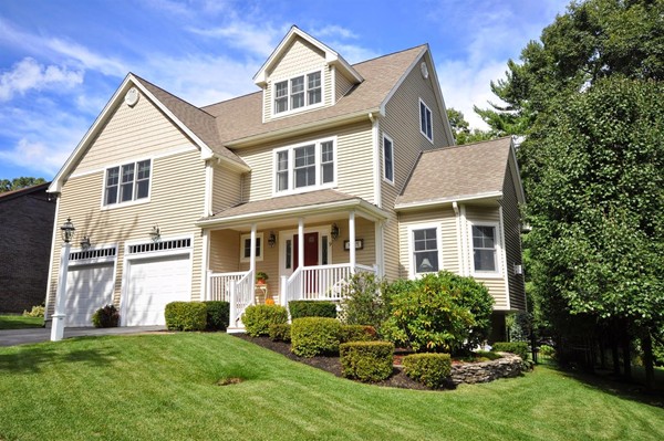 9 Oldham Road Arlington, MA 02474 - Photo 1 of 29 a front view of a house with a yard