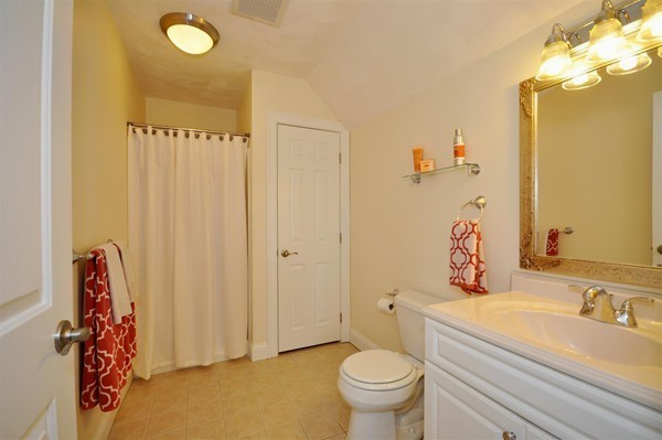 9 Oldham Road Arlington, MA 02474 - Photo 23 of 29 a bathroom with a sink and a mirror