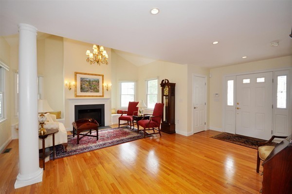 9 Oldham Road Arlington, MA 02474 - Photo 6 of 29 a bed room with a bed and a fireplace