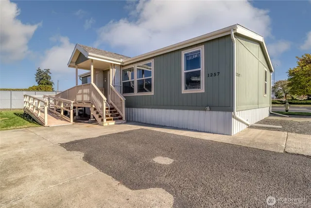 a house view with a garden space