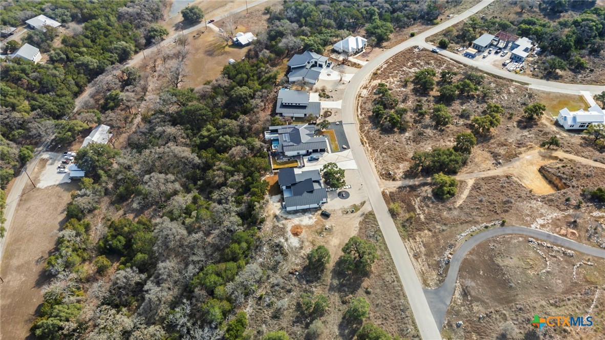 2603 Campestres Spring Branch, TX 78070 - Photo 4 of 7 an aerial view of residential house with outdoor space