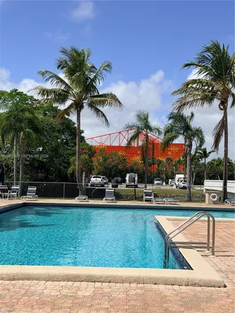 a view of outdoor space with swimming pool and patio