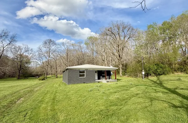 a house view with a garden space