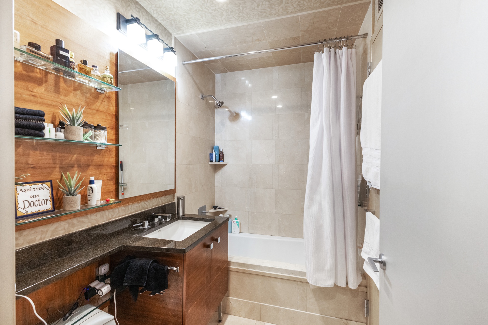 120 Riverside Boulevard, Unit 14C Manhattan, NY 10069 - Photo 7 of 11 a bathroom with a sink and a mirror