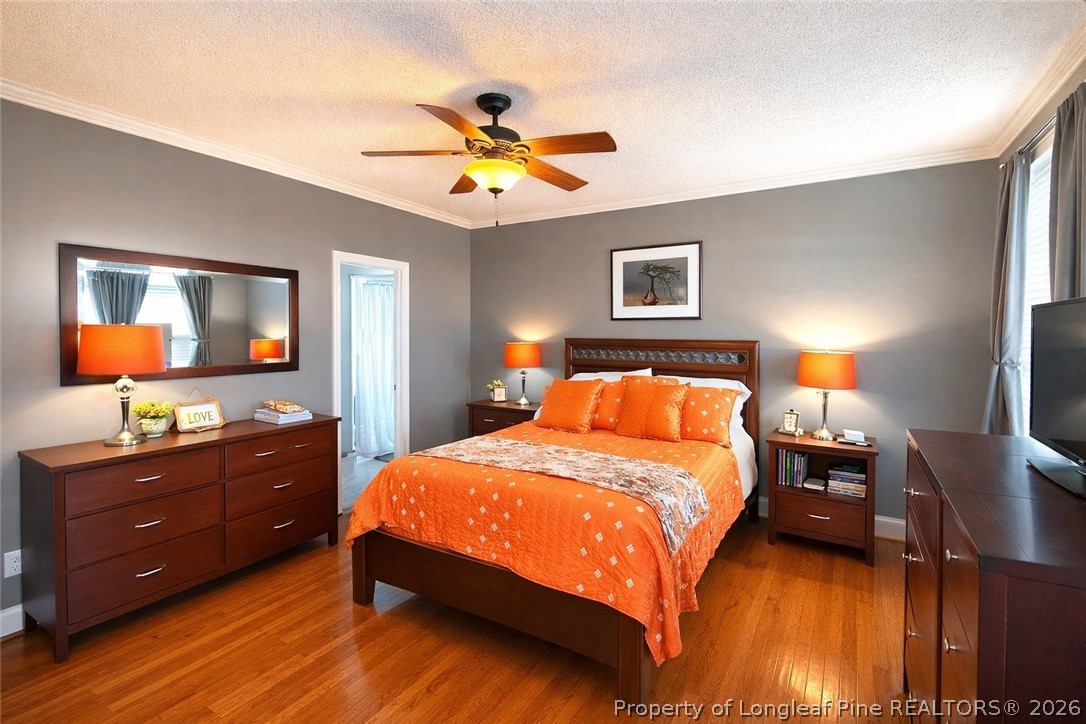 2001 Old Lumberton Road Whiteville, NC 28472 - Photo 13 of 25 a bedroom with a bed and a dresser