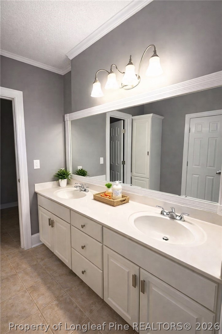 2001 Old Lumberton Road Whiteville, NC 28472 - Photo 15 of 25 a bathroom with a double vanity sink and a mirror