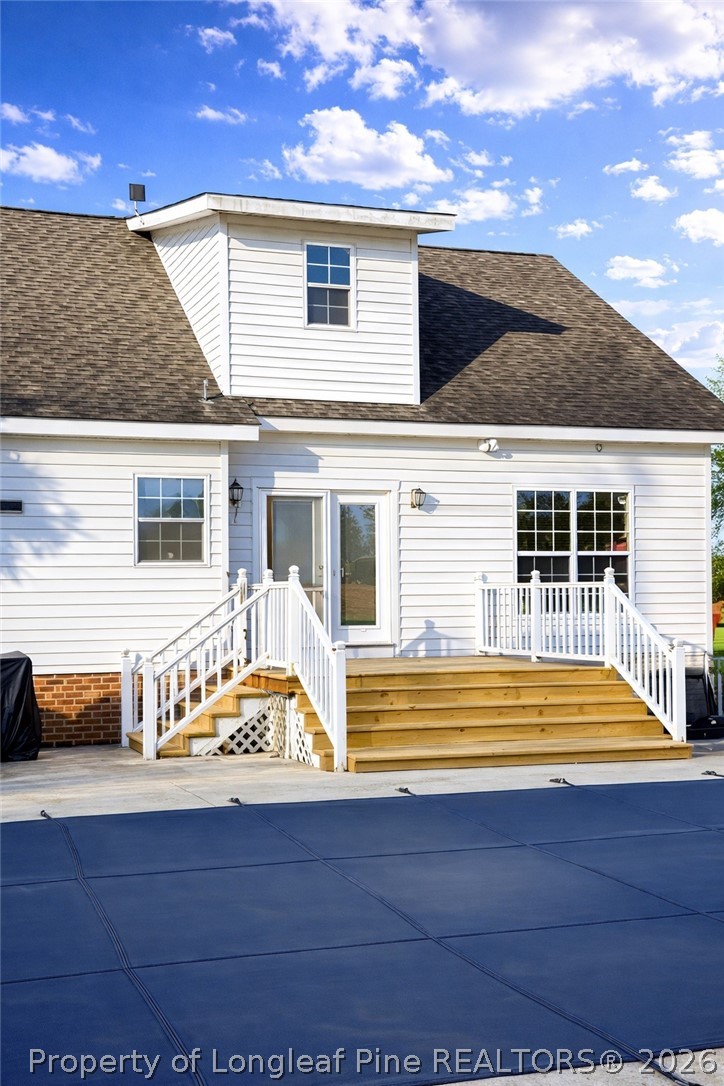 2001 Old Lumberton Road Whiteville, NC 28472 - Photo 20 of 25 a front view of a house with swimming pool