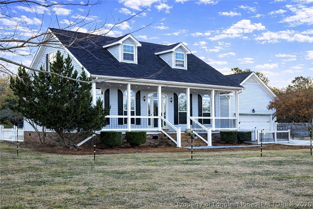 2001 Old Lumberton Road Whiteville, NC 28472 - Photo 2 of 25 a front view of a house with a yard