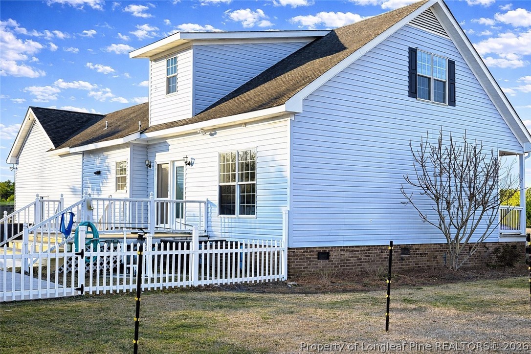 2001 Old Lumberton Road Whiteville, NC 28472 - Photo 24 of 25 a front view of a house with a porch