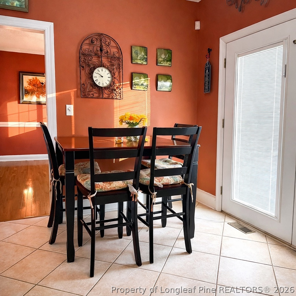 2001 Old Lumberton Road Whiteville, NC 28472 - Photo 8 of 25 a dining room with furniture and wooden floor
