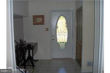 6307 Brooklyn Bridge Road Laurel, MD 20707 - Photo 11 of 17 a view of a livingroom with furniture and a window