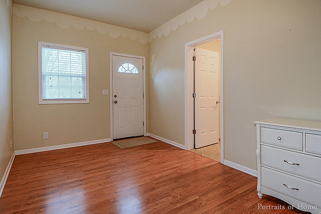 38W194 Pine Road St. Charles, IL 60175 - Photo 21 of 24 a view of an empty room with wooden floor and closet