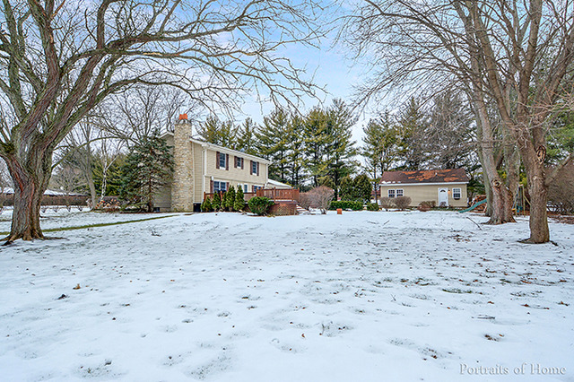38W194 Pine Road St. Charles, IL 60175 - Photo 24 of 24 a view of a house with a yard covered in snow