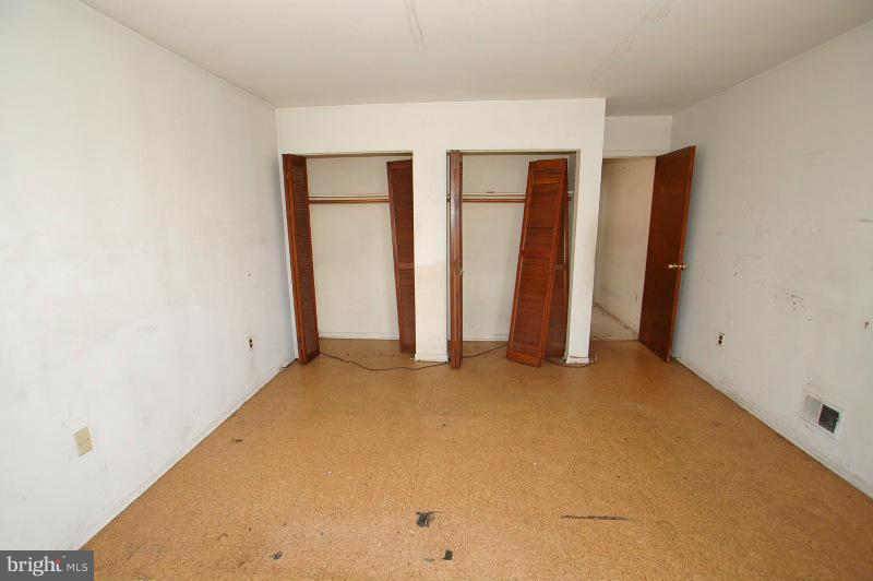 3735 Reisterstown Road Baltimore, MD 21215 - Photo 14 of 29 an empty room with windows
