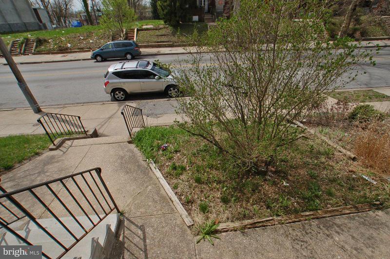 3735 Reisterstown Road Baltimore, MD 21215 - Photo 3 of 29 a view of backyard with outdoor seating and green space