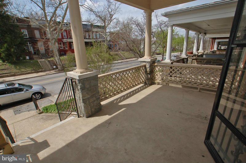 3735 Reisterstown Road Baltimore, MD 21215 - Photo 4 of 29 a view of balcony with two chairs and a table