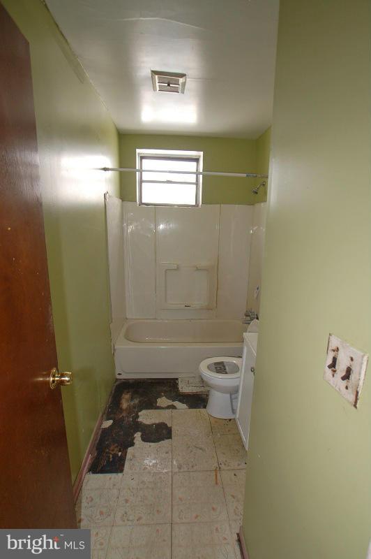 3735 Reisterstown Road Baltimore, MD 21215 - Photo 10 of 29 a bathroom with a toilet