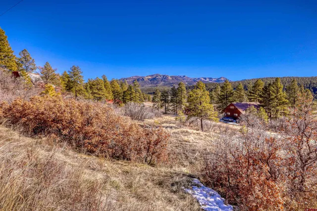 a view of mountains and valleys