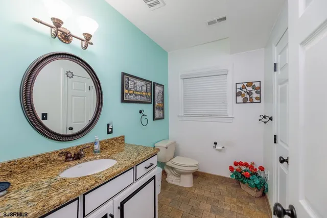 a view of a hallway with washer and dryer