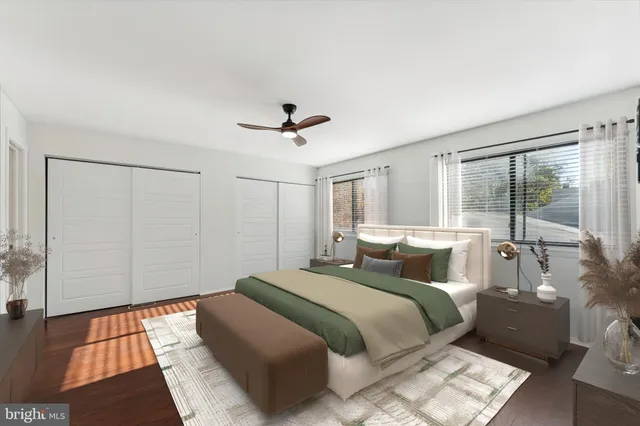 a bed room with a bed and a window